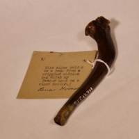 Cigar holder from a crippled chicken bone